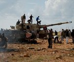 Повстанцы ликуют на руинах Триполи