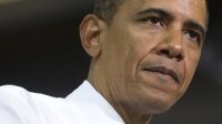 Неизвестный выстрелил в окно предвыборного штаба Обамы