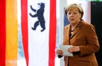 Экзит-поллы отдали партии Меркель победу на выборах в Германии